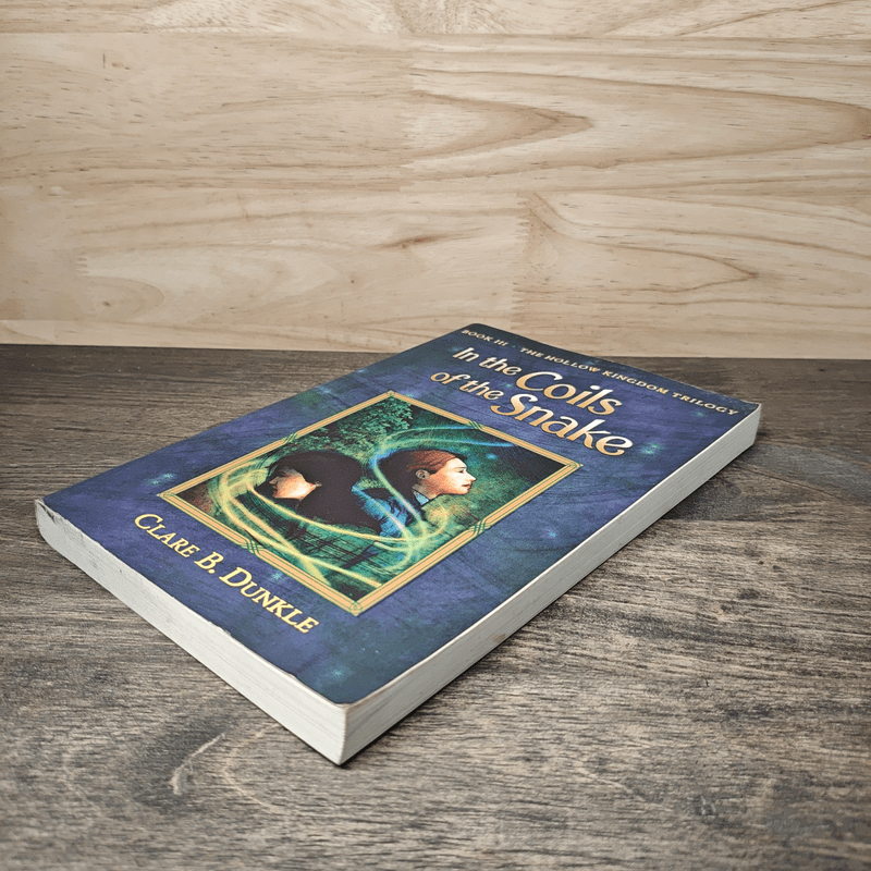 In The Coils of the Snake - Clare B.Dunkle