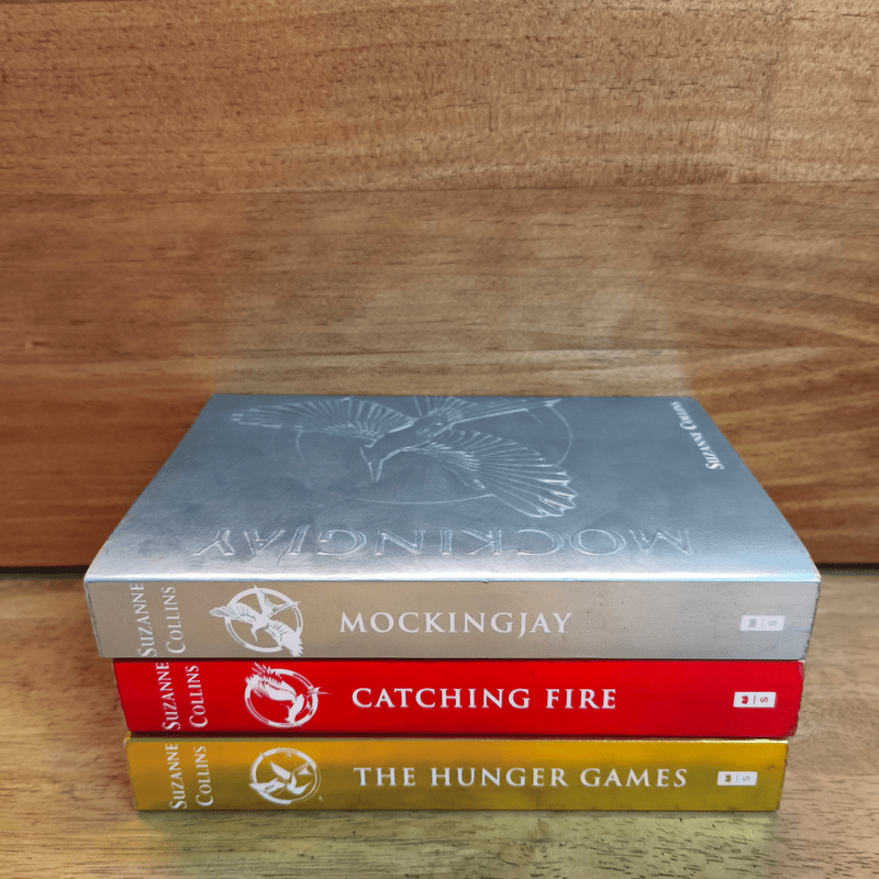 The Hunger Games + Mockingjay + Catching Fire - Suzanne Collins